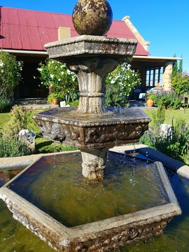 Trickling water fountain infront of Magrietjie and Bloureën chalets